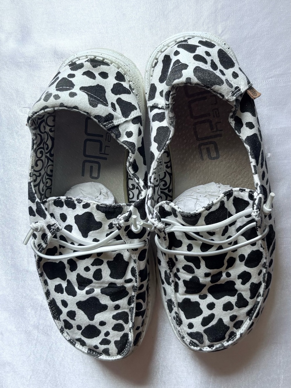 Cow print hey dudes women. Size 8
